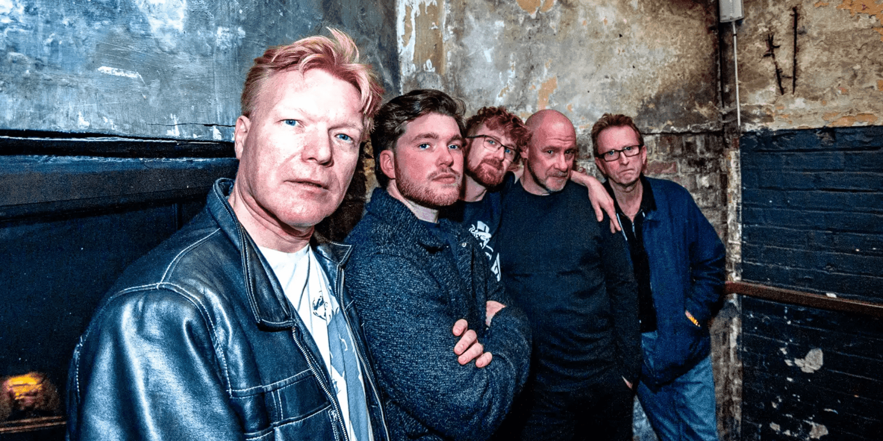 Big Country four male band members in casual clothing outdoor group photo