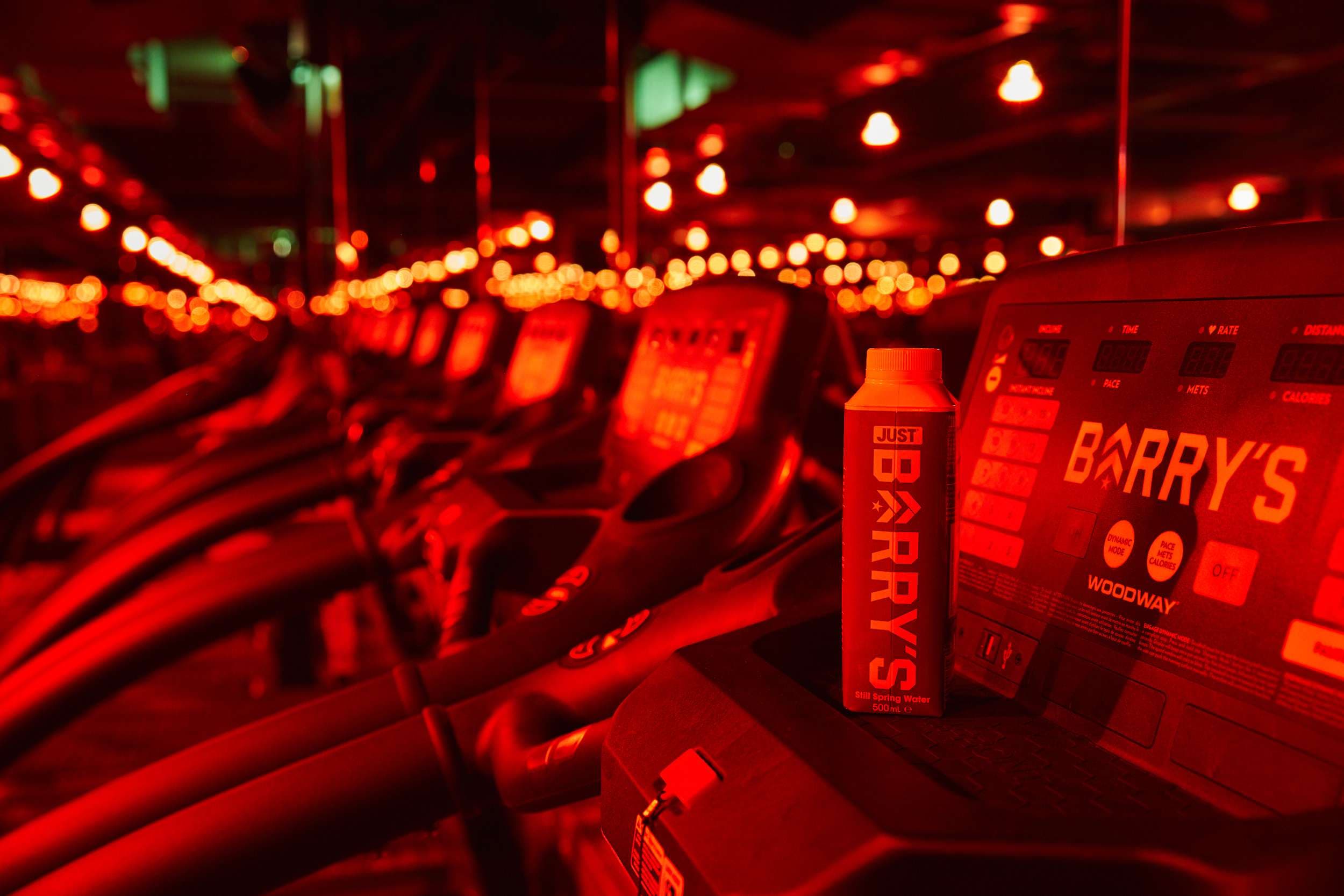Barry's gym room St Paul's interior with warm red ambient lighting January 2020
