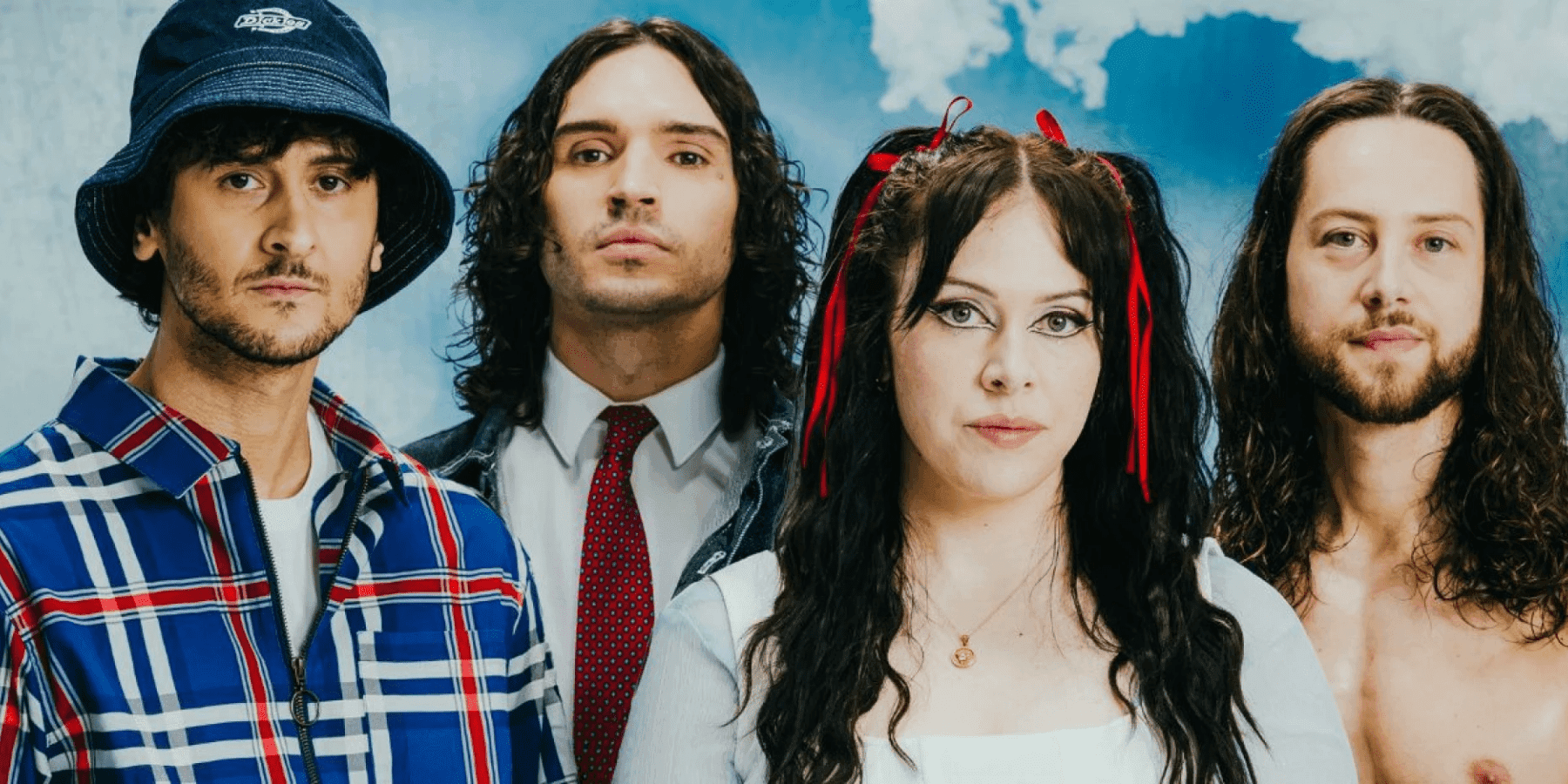 Unpeople young dark-haired woman band promotional close-up portrait