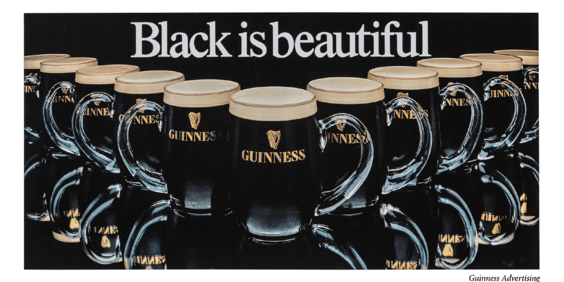 Black is Beautiful Guinness craft beer cans with branded labels on dark background